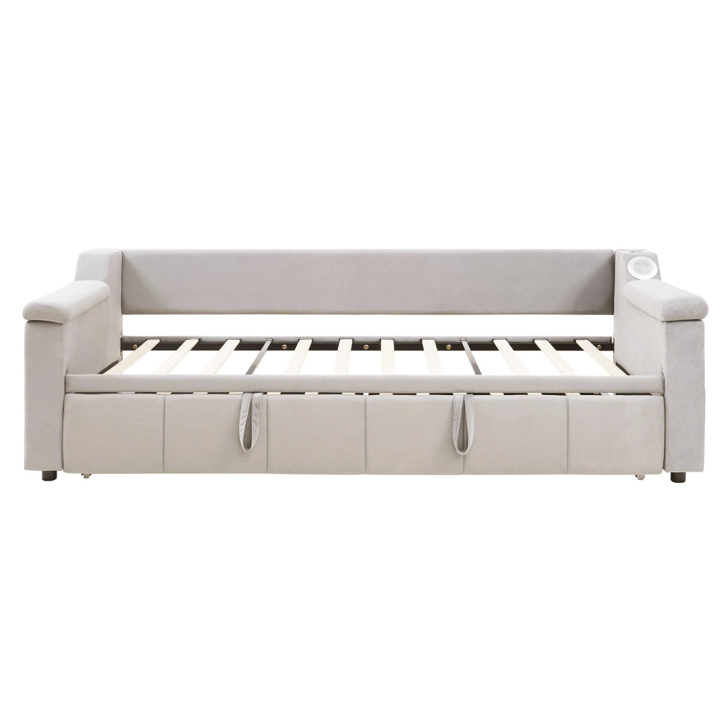 Divano letto in velluto beige 90/180x190 cm con Bluetooth, USB e vani portaoggetti