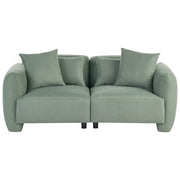 Divano imbottito minimalista a profilo ribassato a 3 posti con seduta profonda verde chiaro stile minimalista