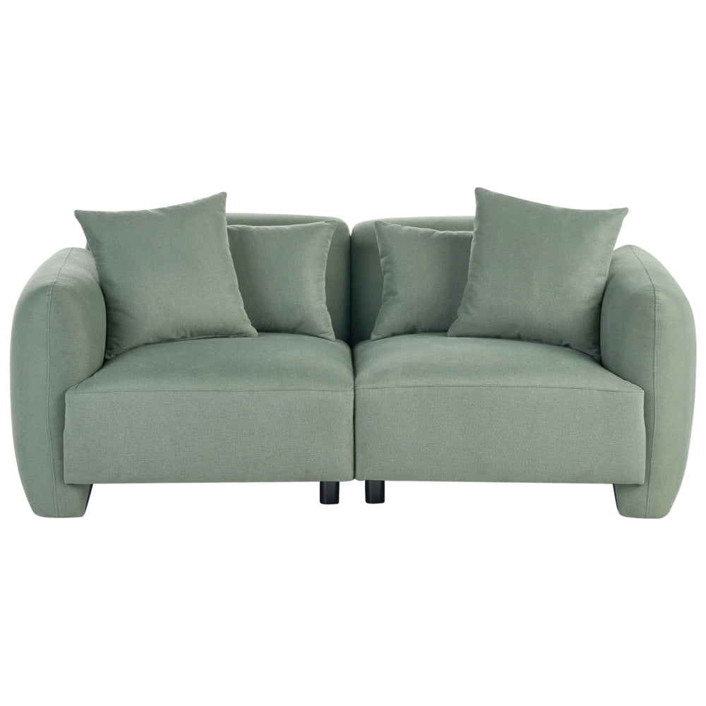 Divano imbottito minimalista a profilo ribassato a 3 posti con seduta profonda verde chiaro stile minimalista