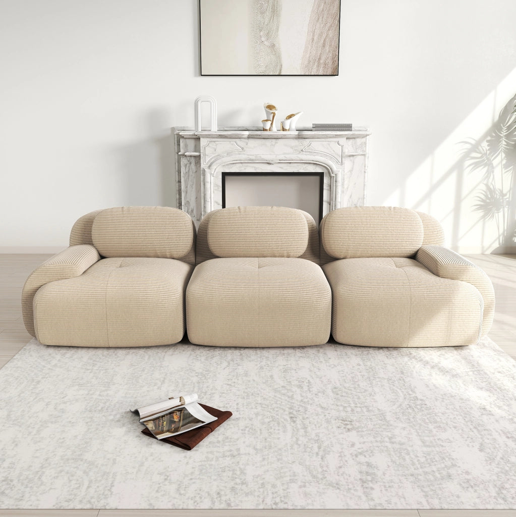 divano angolare modulare 3 posti senza struttura con base antiscivolo e braccioli curvi in velluto a coste beige