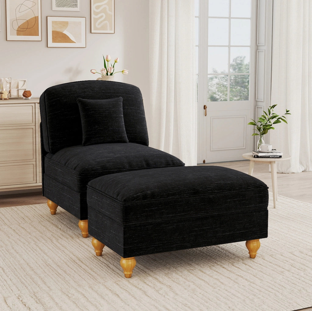 Poltrona lounge in chenille con pouf; balza removibile e cuscino mobile; nero