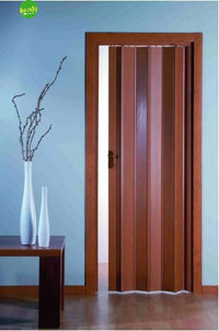 PORTA A SOFFIETTO CON SERRATURA IN KIT LINEA EXTRA IN PVC  cm.82x210 noce    PINTO