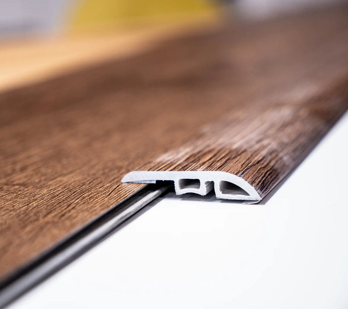 PROFILO DI ADATTAMENTO PER PAVIMENTO IN SPC Colore Noce