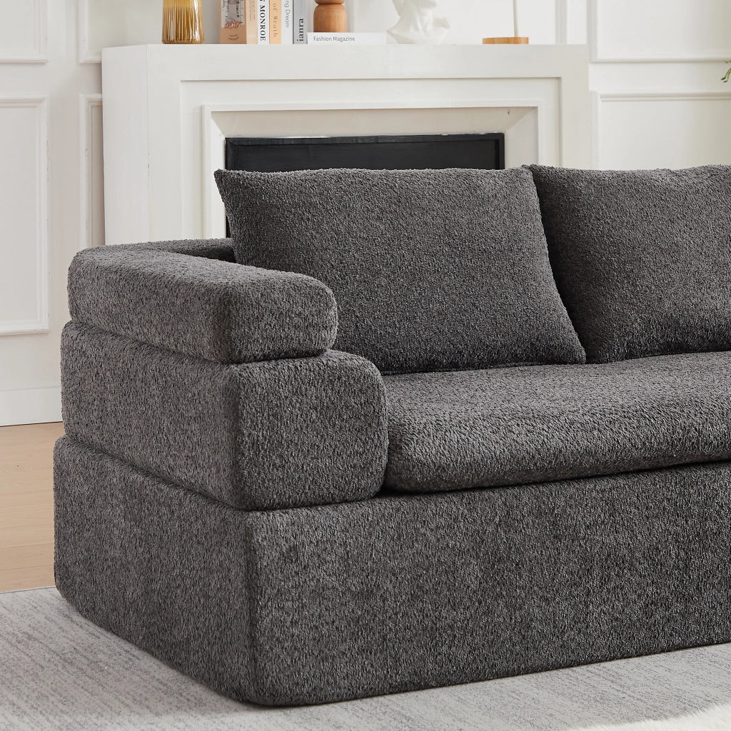 Divano angolare con chaise longue in chenille con bracciolo a gradini e schienali imbottiti grigio antracite