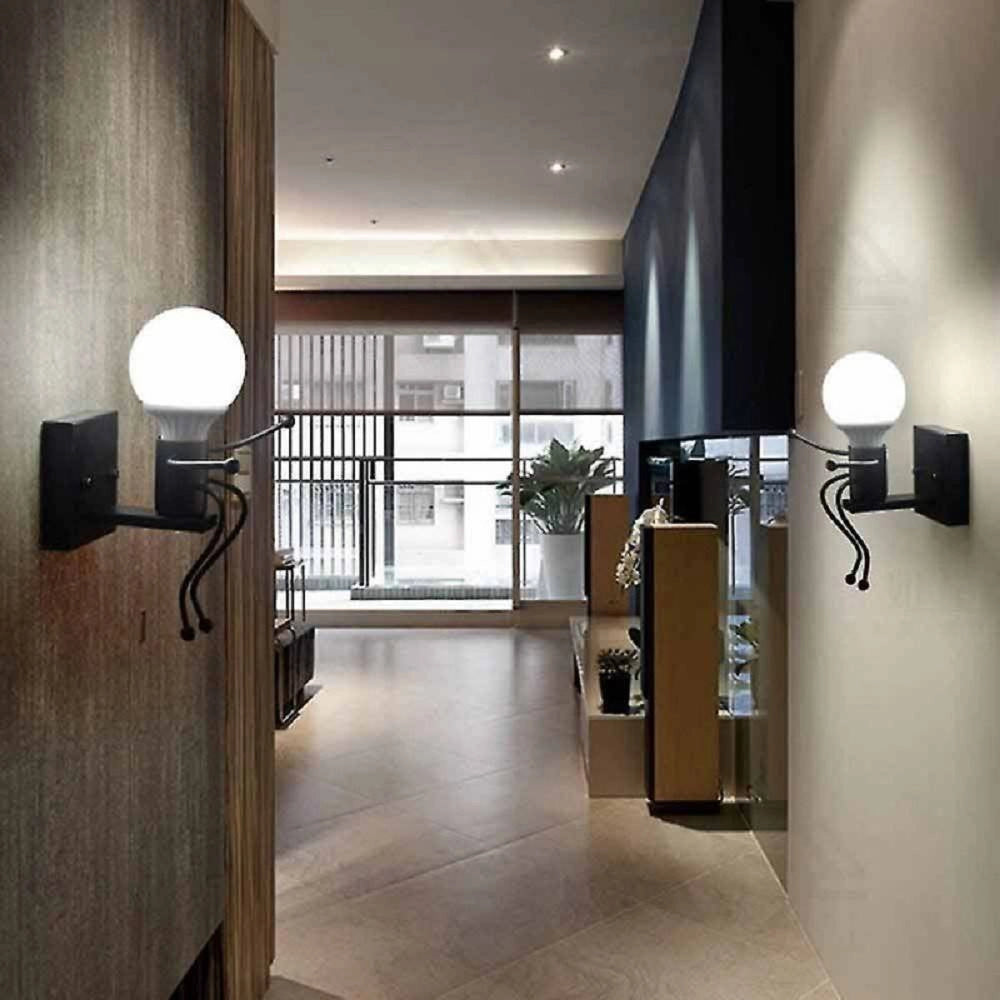 Trade Shop - Applique Da Parete Decorativo Forma Di Omino Seduto In Metallo Attacco E27 Aq51 - Nero