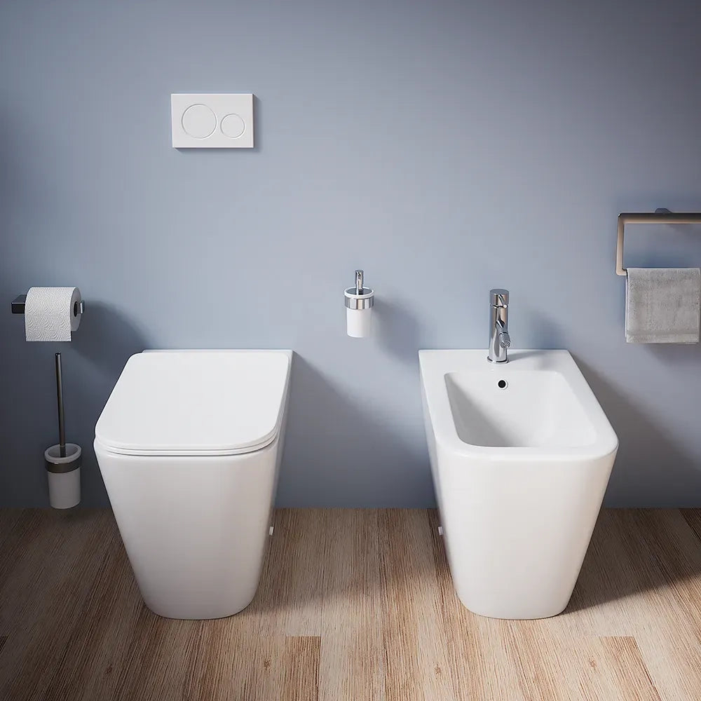 Coppia sanitari in ceramica filomuro vaso rimless, bidet e copri-wc bianco opaco | Kyoto