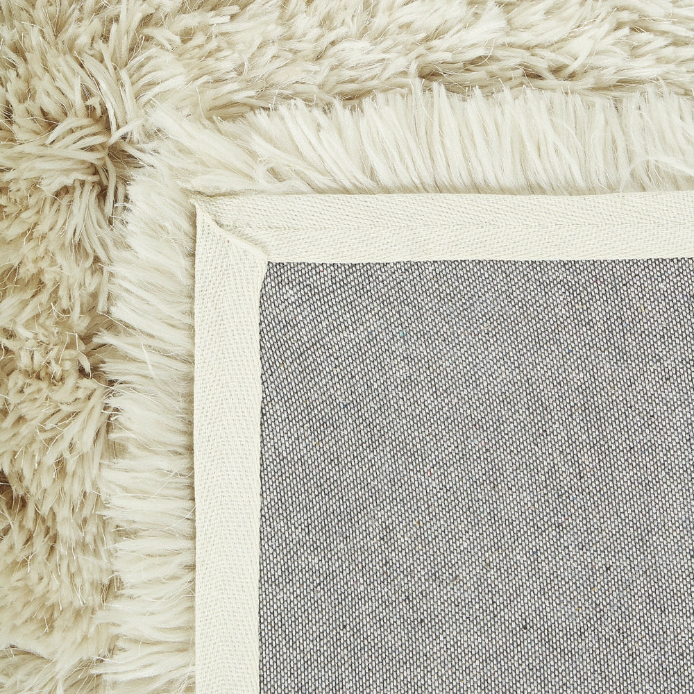 Tappeto Shaggy Tappeto a pelo lungo Solid Beige Poliestere Rettangolare 140 x 200 cm
