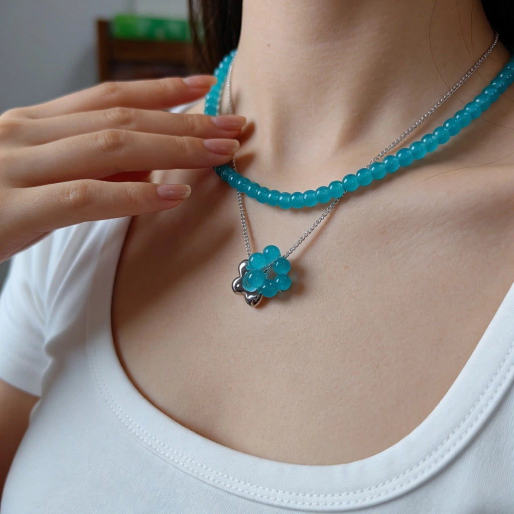 Collana a strati con fiori occhio di gatto