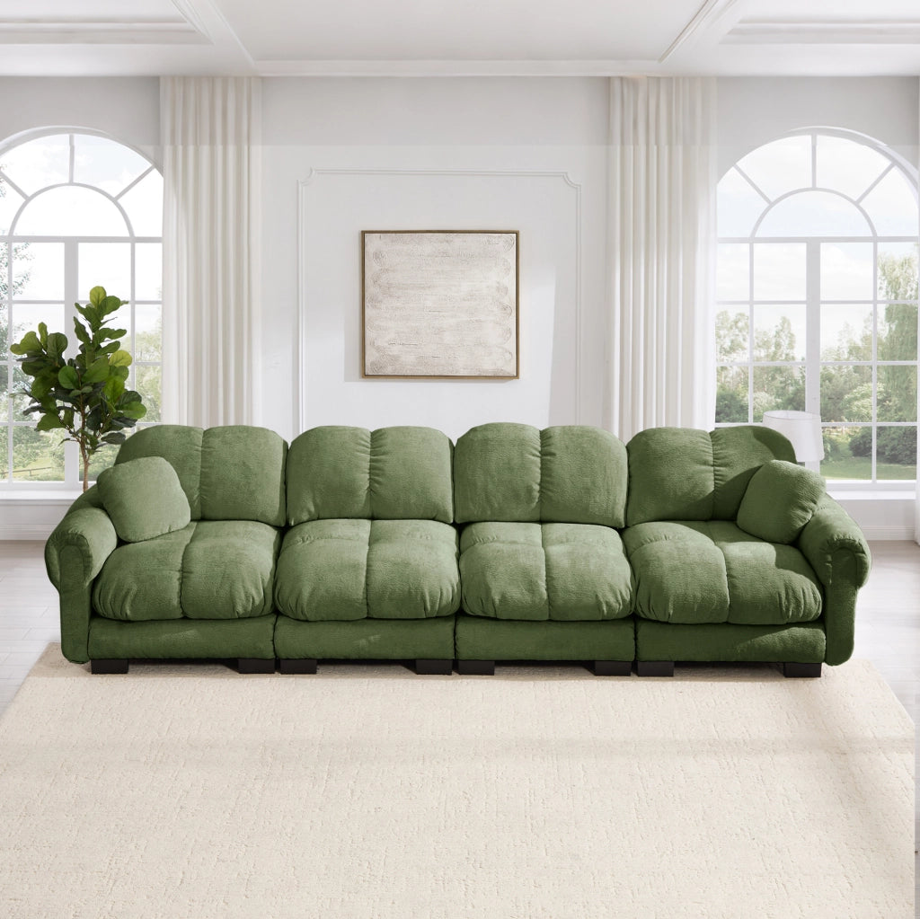 Divano modulare in chenille verde con braccioli curvi e cuscini trapuntati 330x86x90 cm