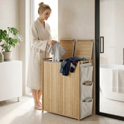Cesto portabiancheria 63x33x78 cm con coperchio; 2 sacchi e tasche laterali in bambù naturale