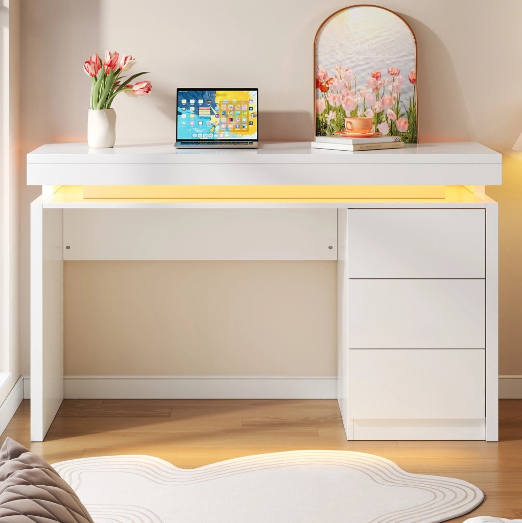 Scrivania LED 120x50x78.5 cm con tre cassetti e illuminazione multicolore in MDF bianco