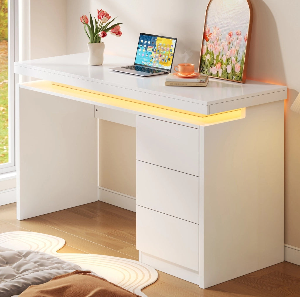 Scrivania LED 120x50x78.5 cm con tre cassetti e illuminazione multicolore in MDF bianco