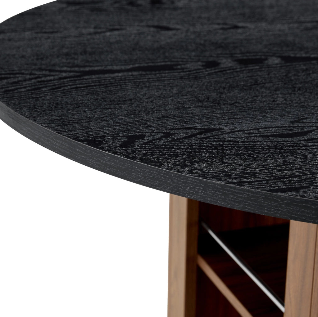 Tavolo da pranzo rotondo 100 cm con vani contenitore; effetto noce e nero; in MDF
