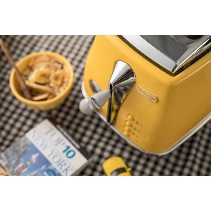 DELONGHI ICONA CAPITALS Tostapane 2 fette - 900W - Tostapane 3 funzioni - Scaldapasta incluso - Giallo