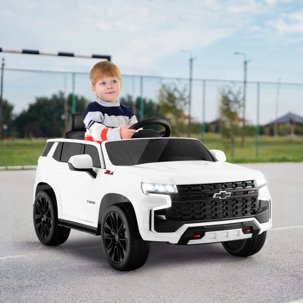 SUV elettrica 12V per bambini con telecomando 2,4G sospensione a molla luci e musica, Chevrolet auto elettrica Bianco-Macchinine giocattoli