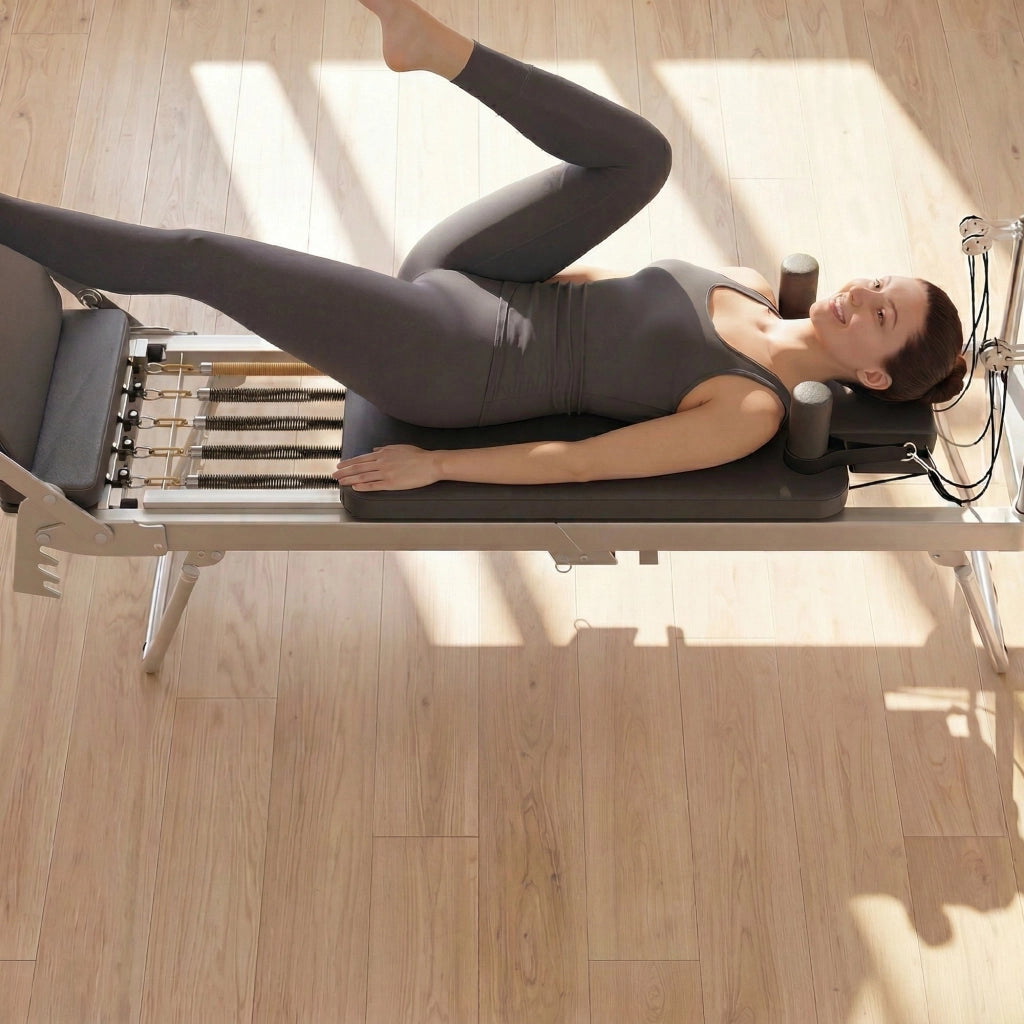 Reformer Pilates Pieghevole 195x56x88 cm con 2 Bande Elastiche in Acciaio e PU Bianco