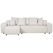 Divano angolare a destra in tessuto beige chiaro a 3 posti con cuscini extra sparsi Soggiorno moderno