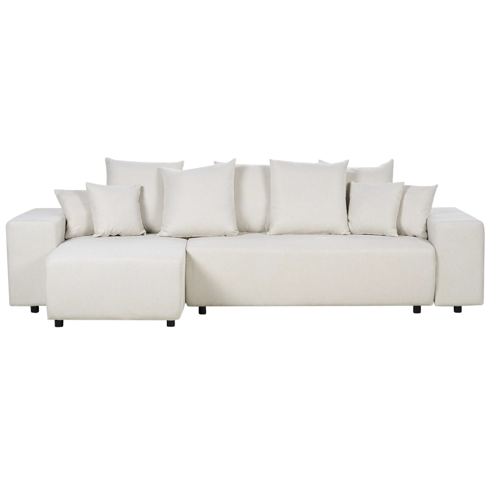 Divano angolare a destra in tessuto beige chiaro a 3 posti con cuscini extra sparsi Soggiorno moderno