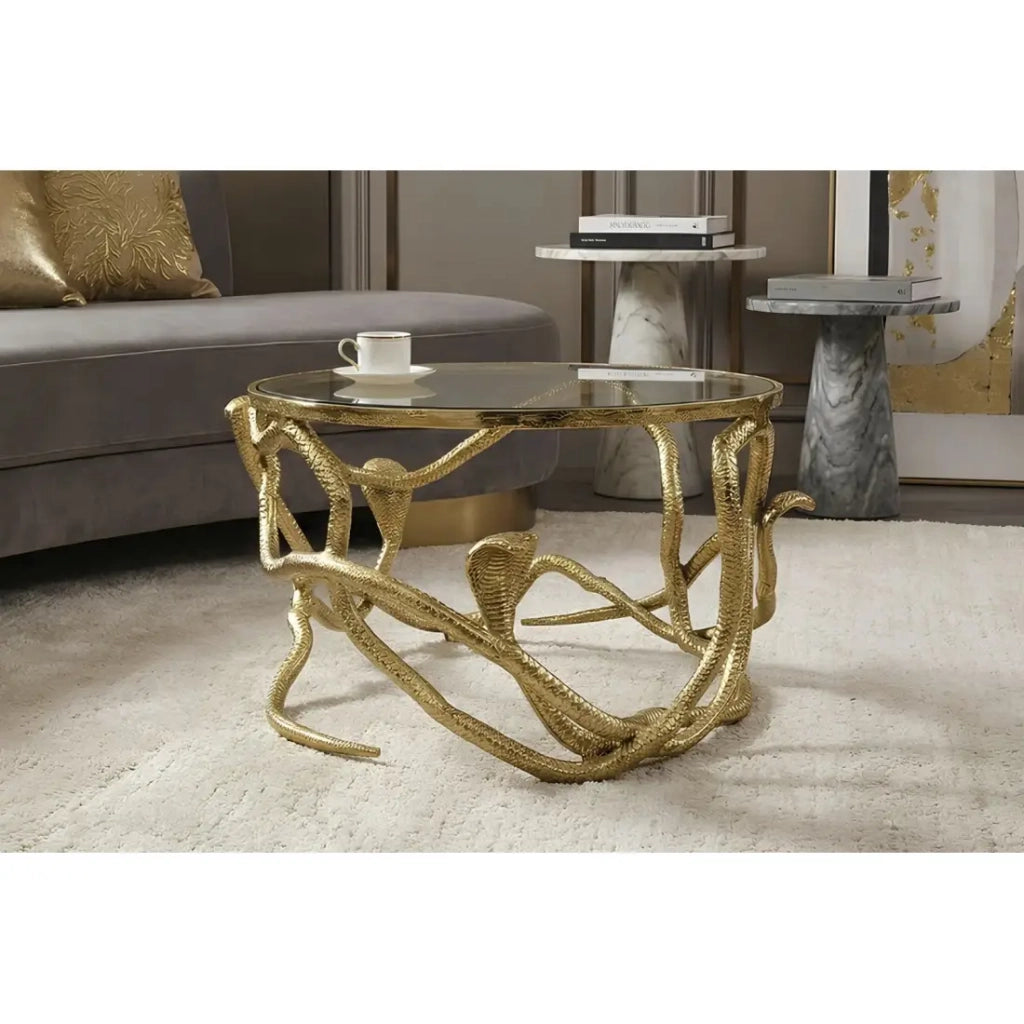 Tavolino basso VIPEREA rotondo 67 cm dorato con serpenti in alluminio e vetro temperato
