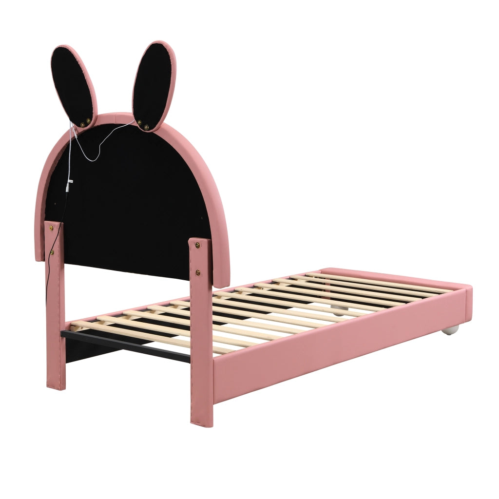 Letto per bambini 90x200 cm, testiera a forma di coniglio, luci a LED, bordi imbottiti antiurto, materiale PU, rosa + bianco