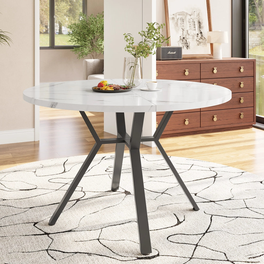 Tavolo da pranzo rotondo con piano effetto marmo e base in metallo a x per sala da pranzo