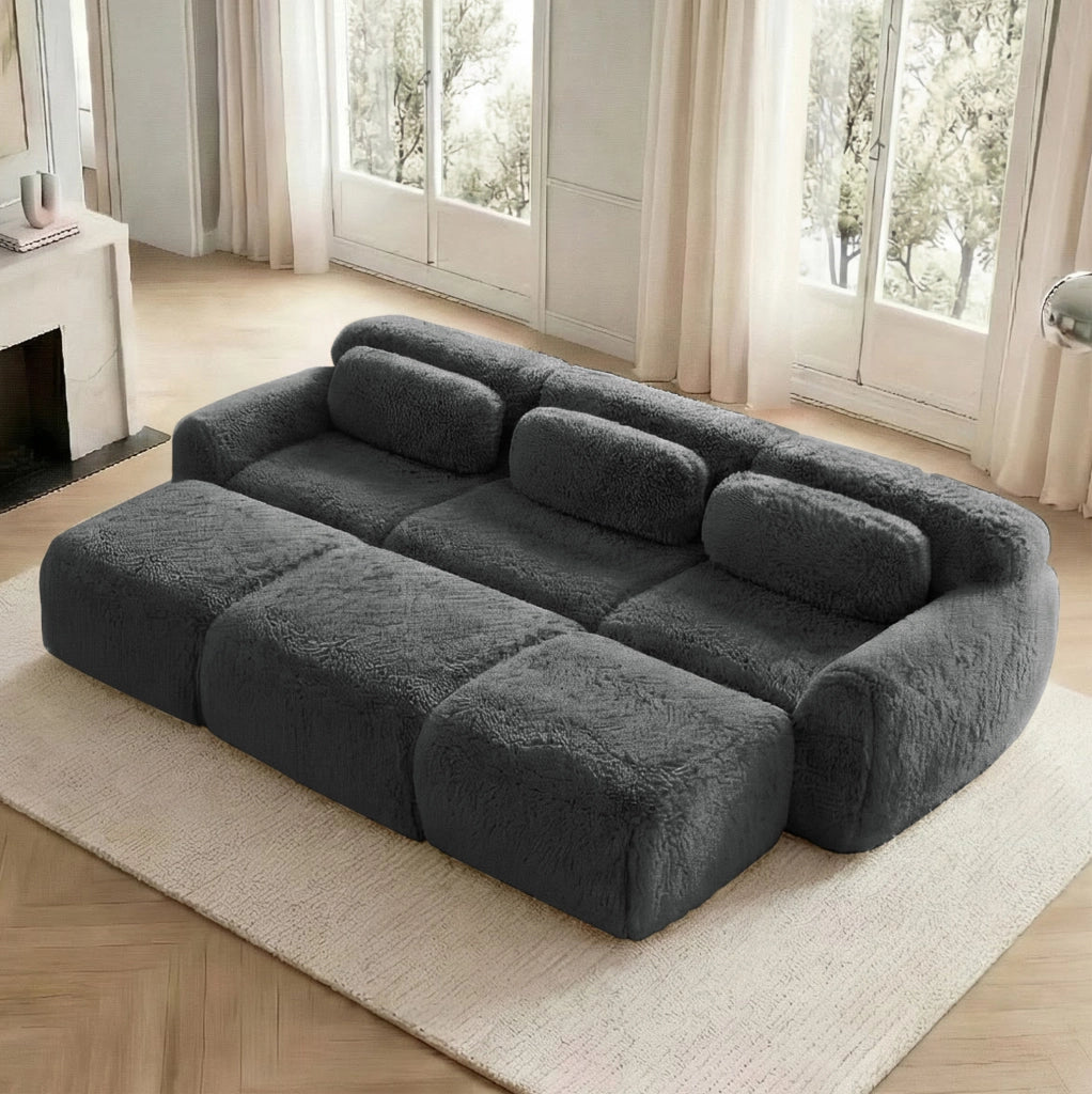 Divano modulare angolare 291x179x73 cm in tessuto peluche grigio; senza montaggio