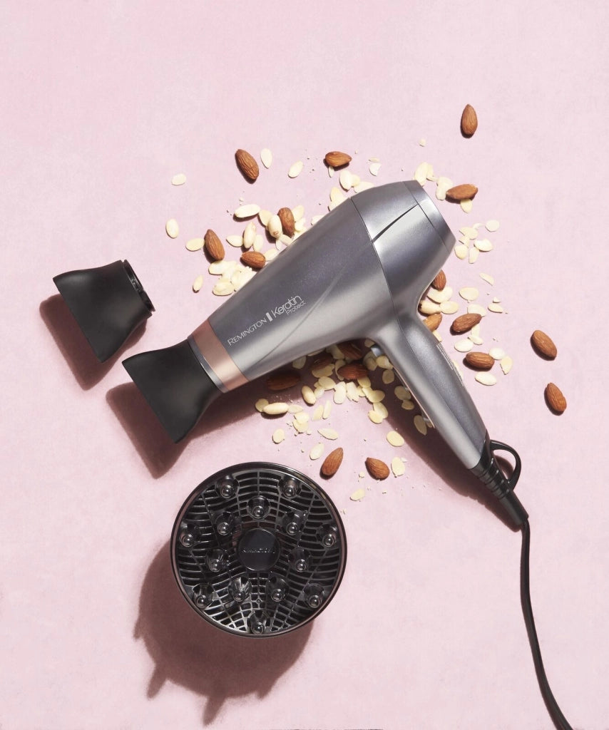 Remington Keratin Protect AC8820 - Asciugacapelli professionale 2200W con motore AC, 3 temperature e 2 velocita', colpo d'aria fredda, tecnologia cheratina-olio di mandorla, concentratore e diffusore inclusi, colore Bronzo-Grigio