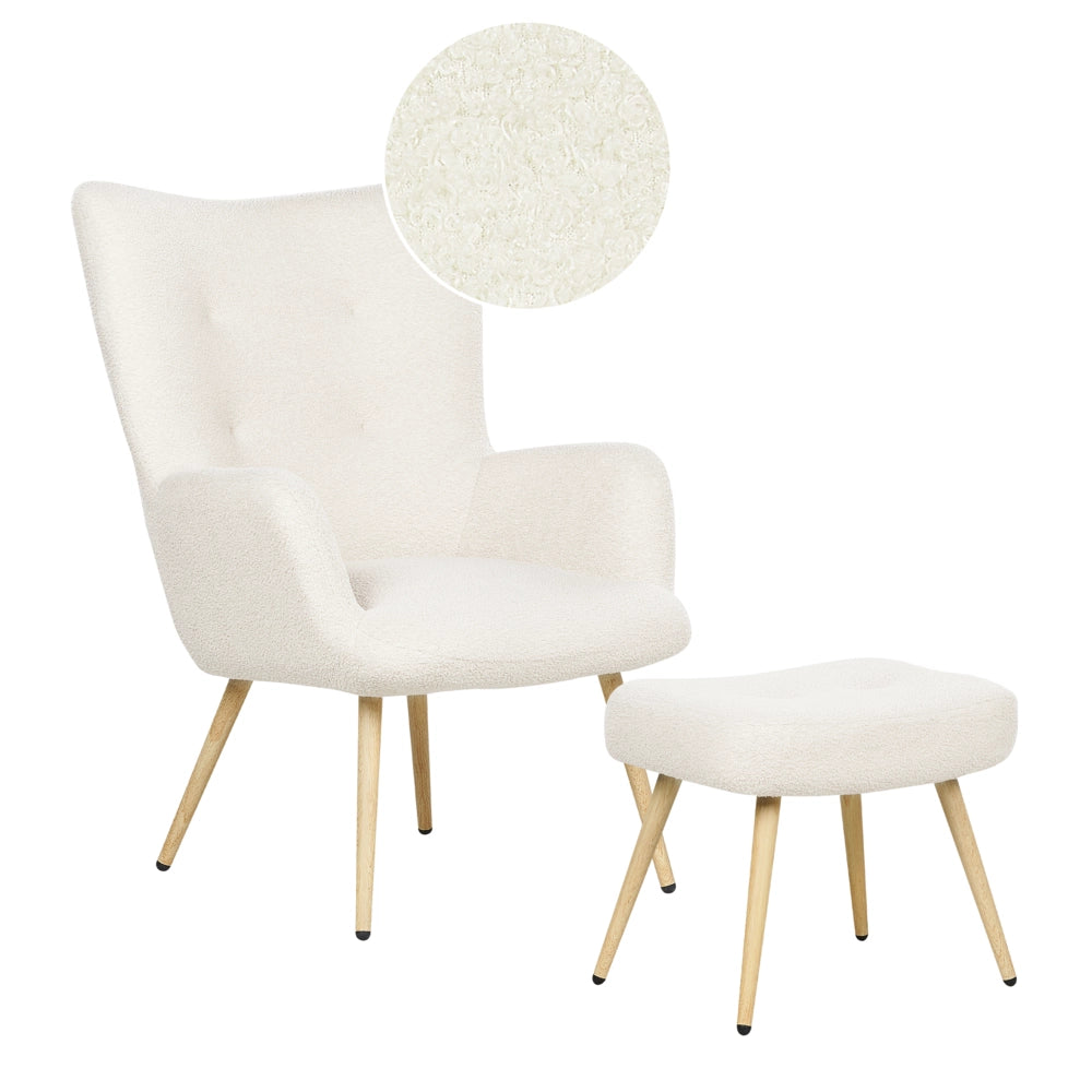 Poltrona rivestita in tessuto beige con motivo floreale con poggiapiedi in stile retrò