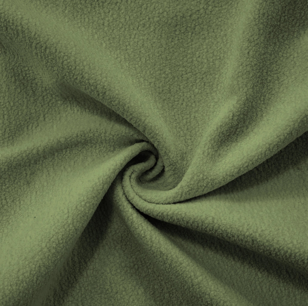Divano modulare in chenille verde con seduta profonda e braccioli imbottiti arrotondati