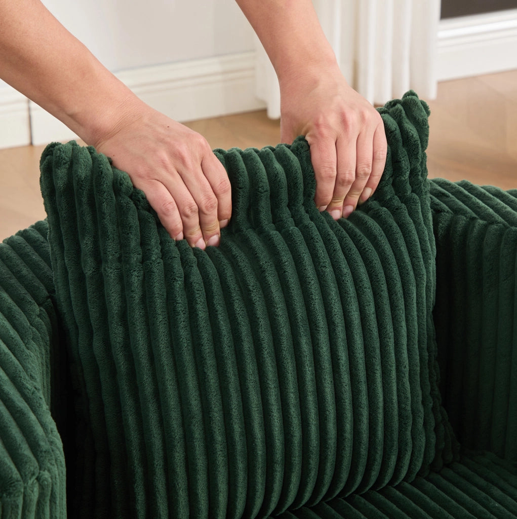 Poltrona girevole 360° in corduroy verde smeraldo con vano contenitore; 76x79x78 cm