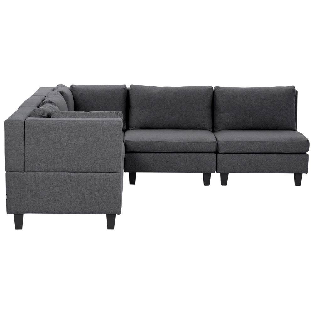 Divano componibile a 5 posti imbottito in tessuto grigio scuro gambe nere lato destro stile moderno