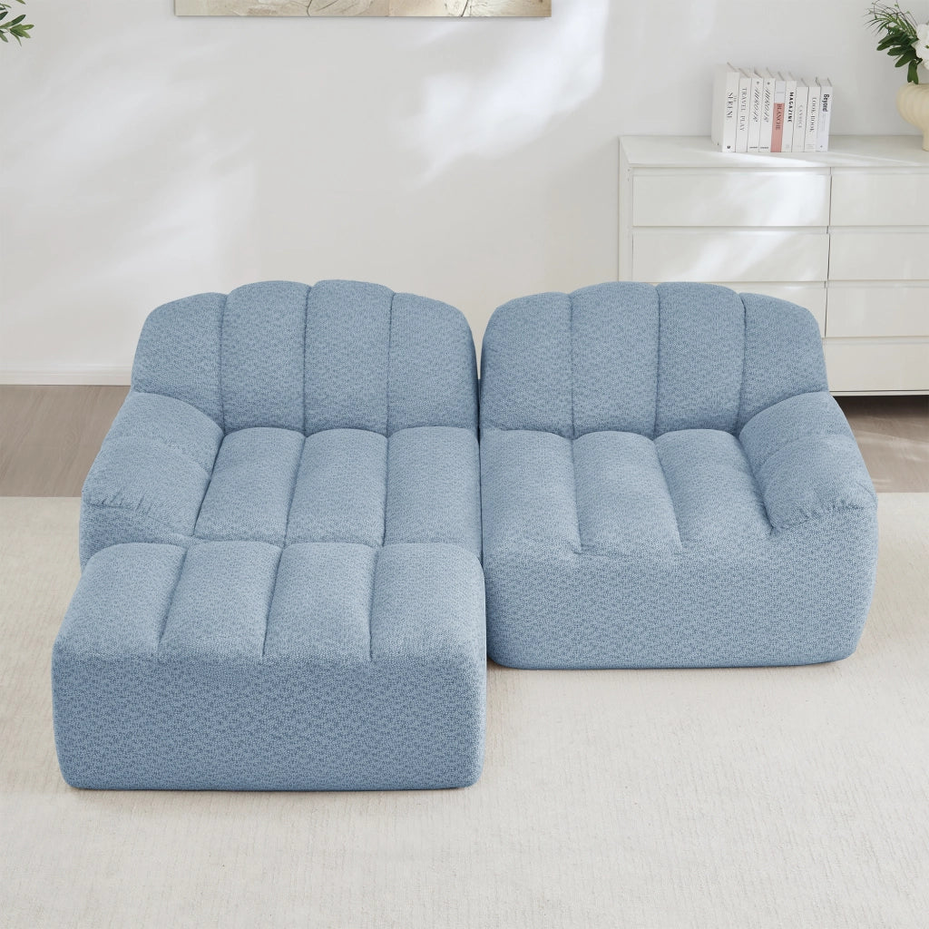 Divano angolare modulare senza struttura con ottomano e seduta ampia in pile granulato blu 210 × 165 × 79 cm