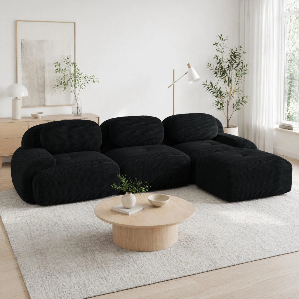 Divano angolare modulare senza montaggio in velluto a coste nero; design ergonomico e struttura senza telaio