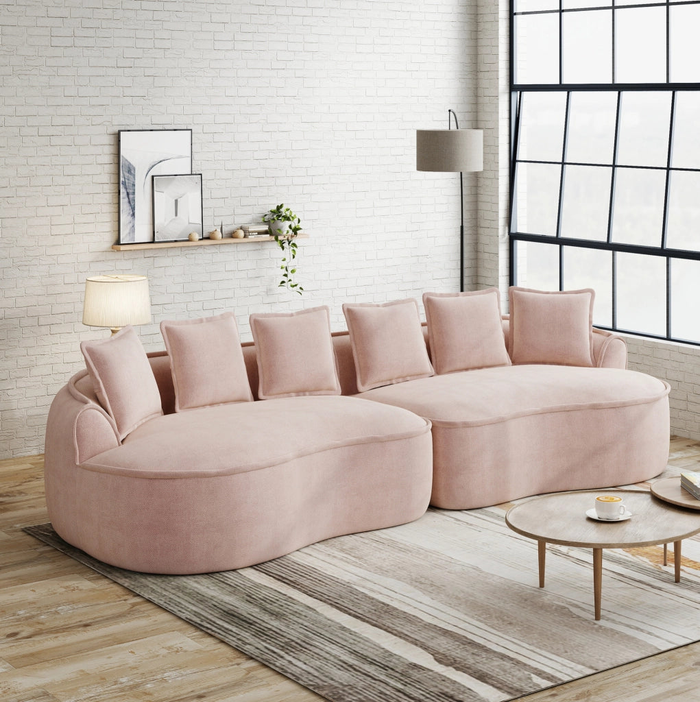 Divano modulare senza struttura in tessuto chenille rosa; con chaise longue profonda e cuscini