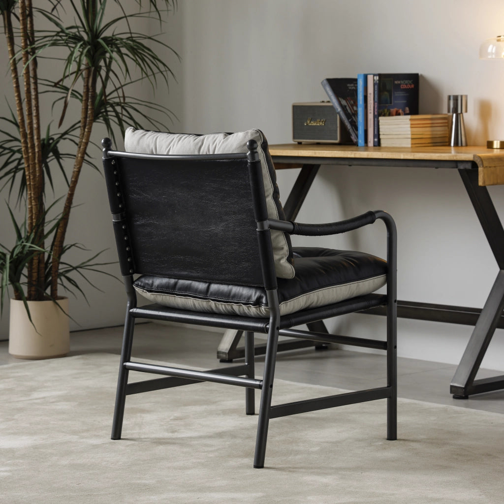 POLTRONA in pelle nera e metallo stile Mid Century Modern