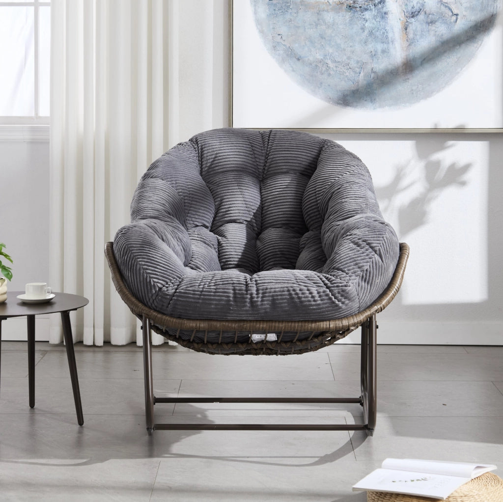 Sedia a dondolo da esterno in rattan sintetico grigio con cuscino