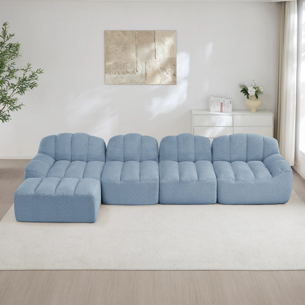 Divano modulare 4 posti con pouf e seduta ampia, schienale ergonomico per soggiorno in fleece granulato blu