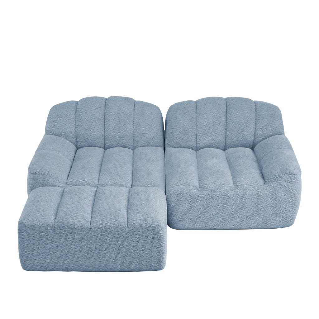 Divano angolare modulare senza struttura con ottomano e seduta ampia in pile granulato blu 210 × 165 × 79 cm
