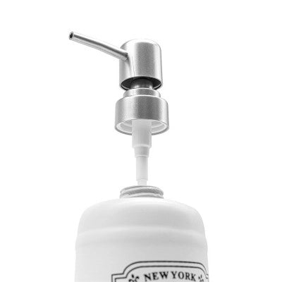 Dispenser sapone in ceramica bianca con stampe a contrasto nere stile vintage