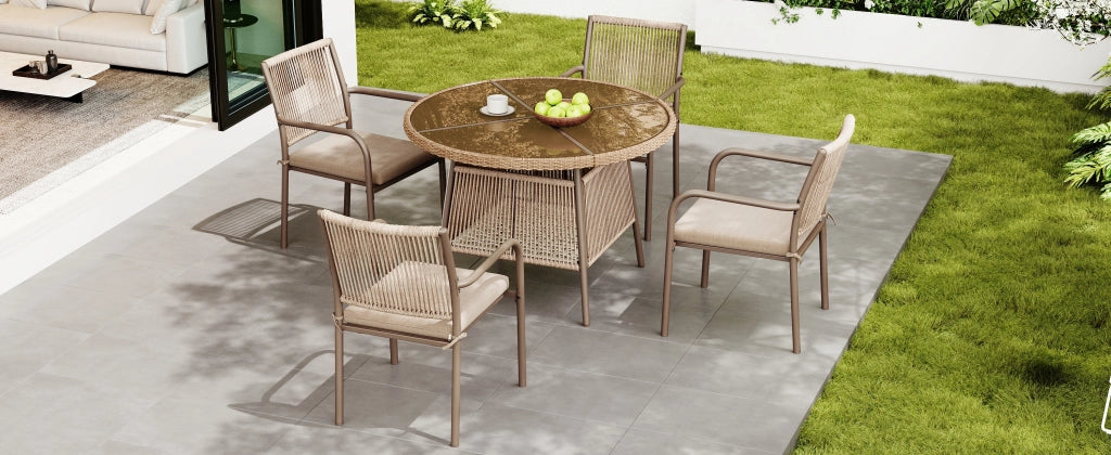 Set salotto polirattan: tavolo rotondo vetro + 4 poltrone; struttura ferro; terrazzo/balcone