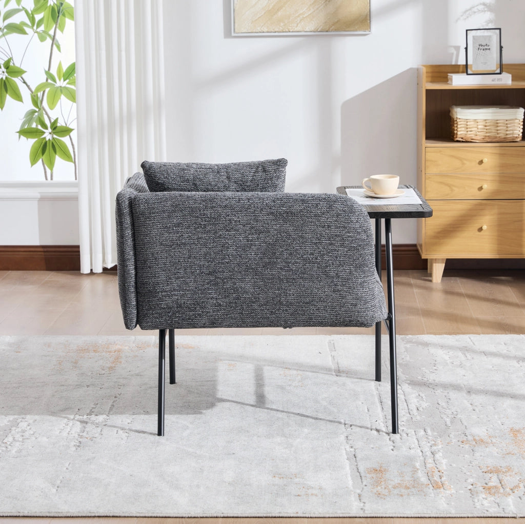 Poltrona in cheniglia grigio scuro con tavolino laterale e tasche