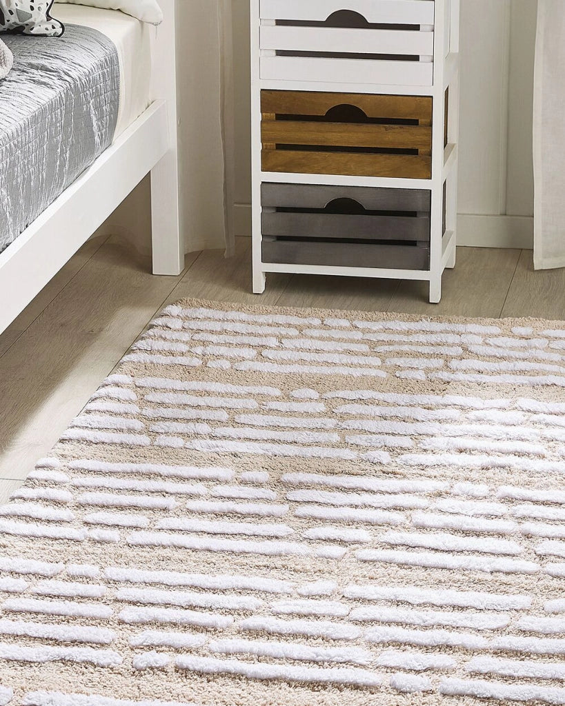 Tappeto Shaggy in cotone beige 120 x 180 cm intrecciato a mano pelo lungo Boho Camera da letto