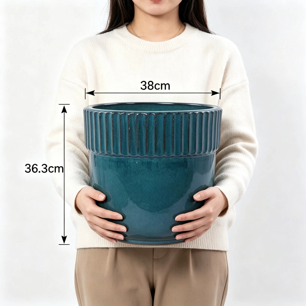 Fioriera in ceramica artigianale smaltata turchese lucido con scanalature verticali per interni e esterni 38 cm