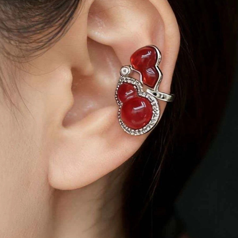 Nuovo orecchino a clip con zucca in zircone rosso
