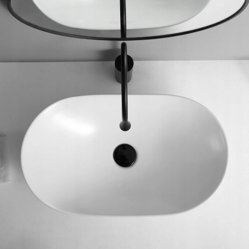 Lavabo ovale da appoggio in ceramica bianca lucida