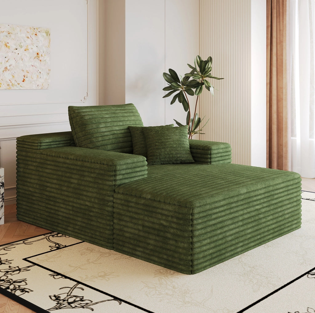Divano modulare in tessuto corduroy verde, seduta profonda e comfort elevato