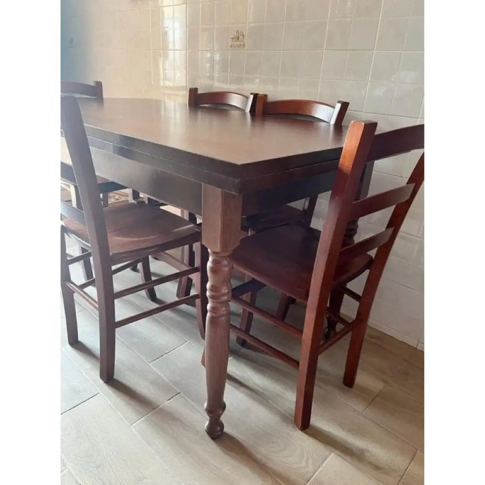 Tavolo arte povera con gambe tornite allungabile fino 220 in legno massello e mdf con rifinitura in noce 140x80x78 H
