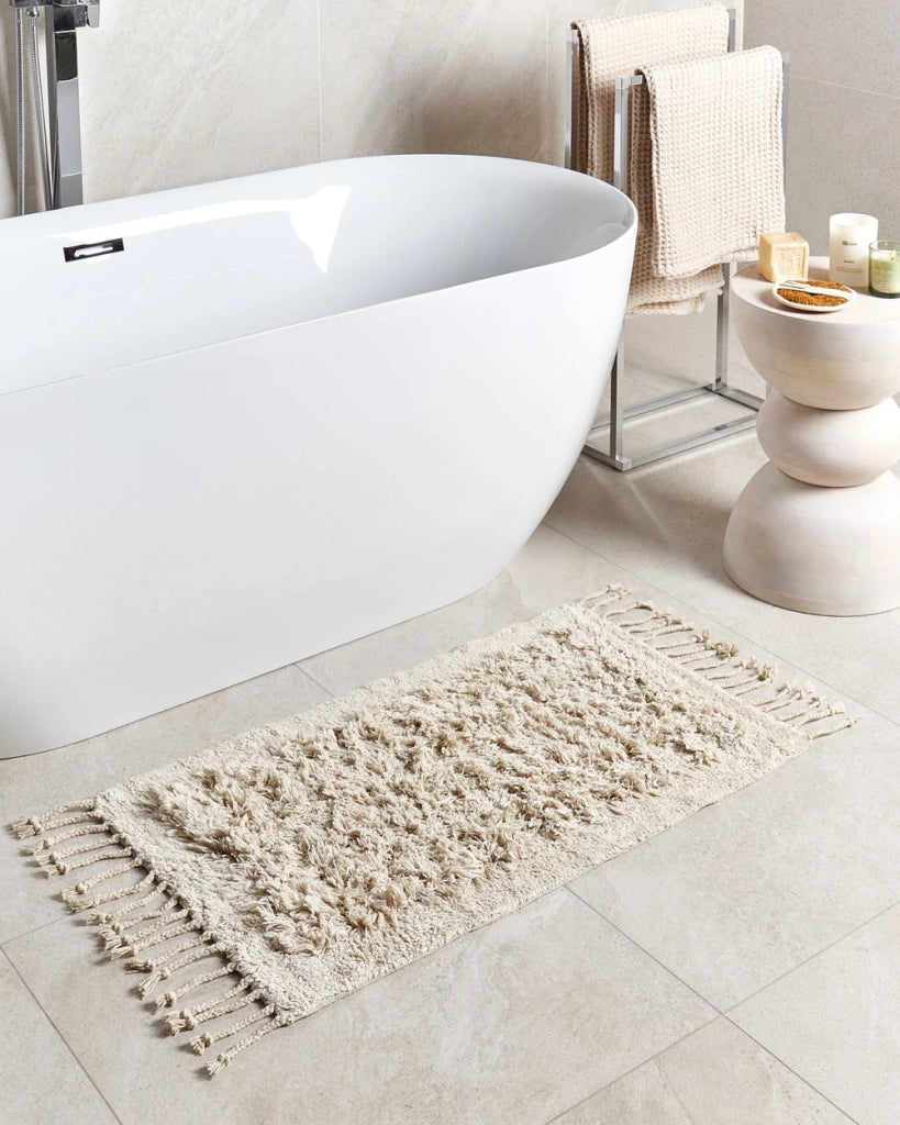 Tappeto da bagno in cotone beige 50 x 80 cm Forma rettangolare Tappeto da bagno con nappe decorative Accessori da bagno Design moderno