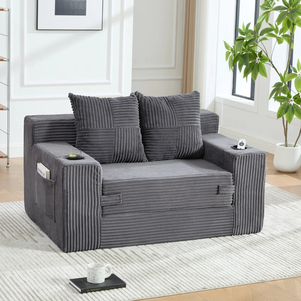 Pouf divano 151x133x64 cm in velluto a coste grigio con tasche laterali e 2 cuscini