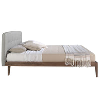 Letto in tessuto grigio trapuntato